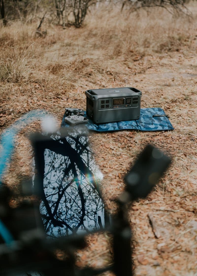 Portable power station with foldable solar panel in an outdoor setting